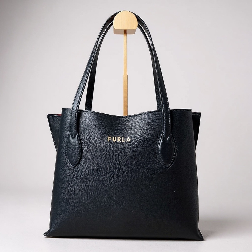 Furla Black Leather Tote with pink suede interior excellent condition like new
